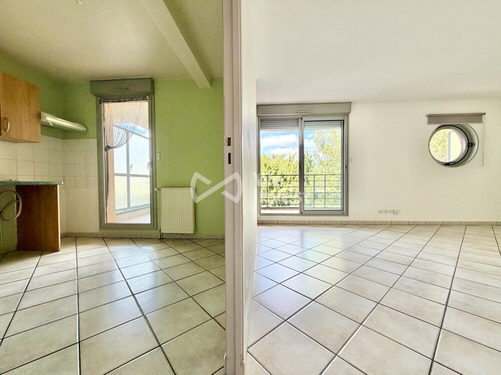 Appartement de type 4 avec terrasse, place de stationnement et g