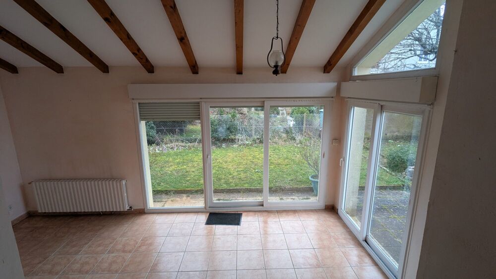Maison divisée en 3 appartements