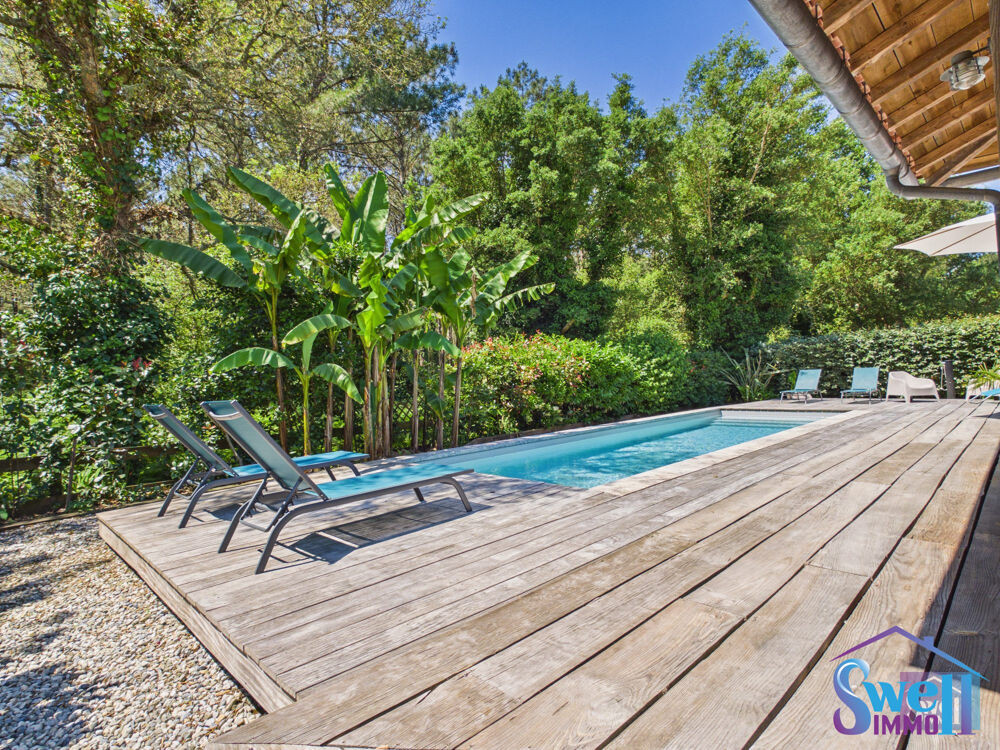 Face à la forêt,Villa ossature bois T6 159m² piscine garage