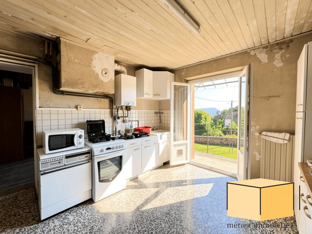 Maison individuelle en pierre avec terrain