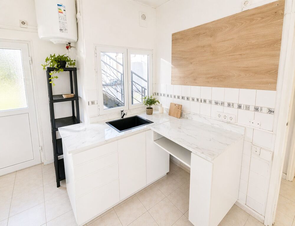 APPARTEMENT EN REZ DE JARDIN