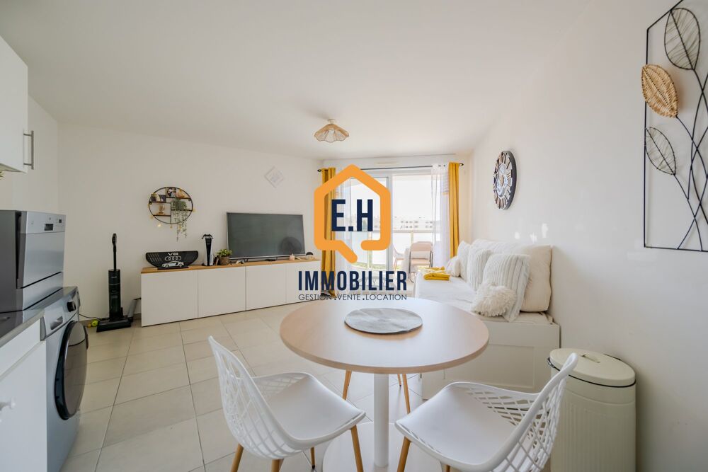 Appartement T2 en résidence récente avec stationnement privati