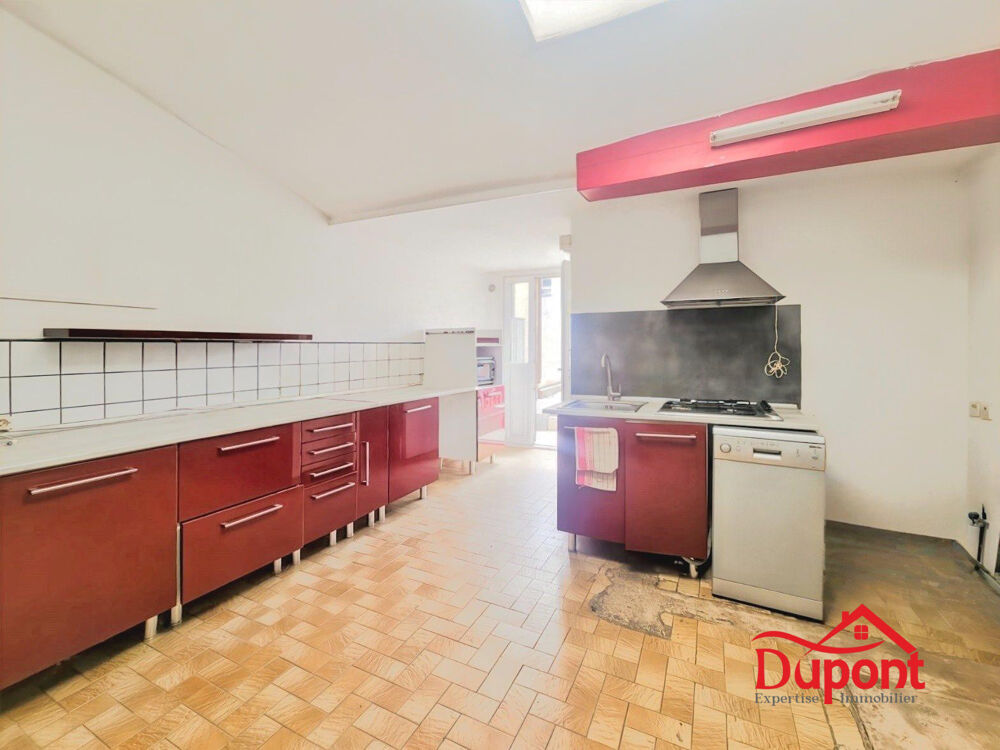Maison de ville, 2 chambres, (possibilités de 3) courette, tera