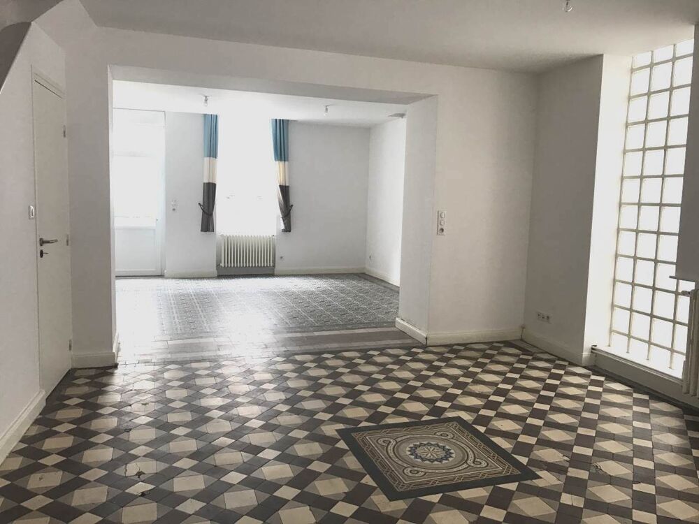 Maison de ville 200 m² plein centre.