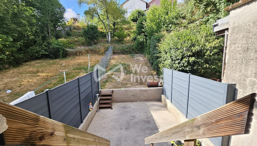 Maison de ville sur sous-sol complet avec véranda, jardin et ga