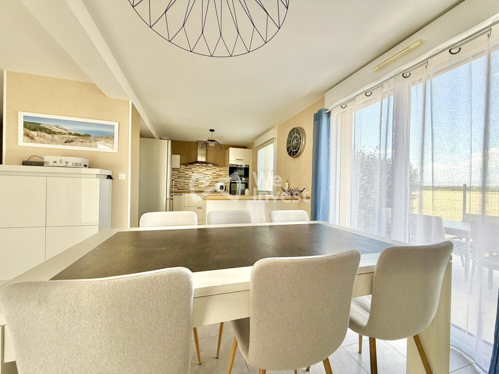 Villa type 5 de 110 m2 avec garage, terrasse, pergola et jardin.