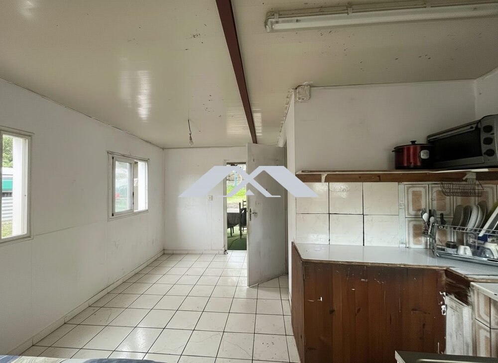 MAISON ANCIENNE DE PLAIN-PIED EN PLEIN CENTRE-VILLE DE LA RIVIÈ