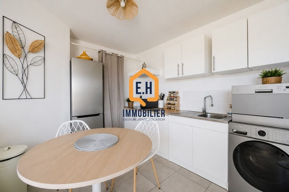 Appartement T2 en résidence récente avec stationnement privati