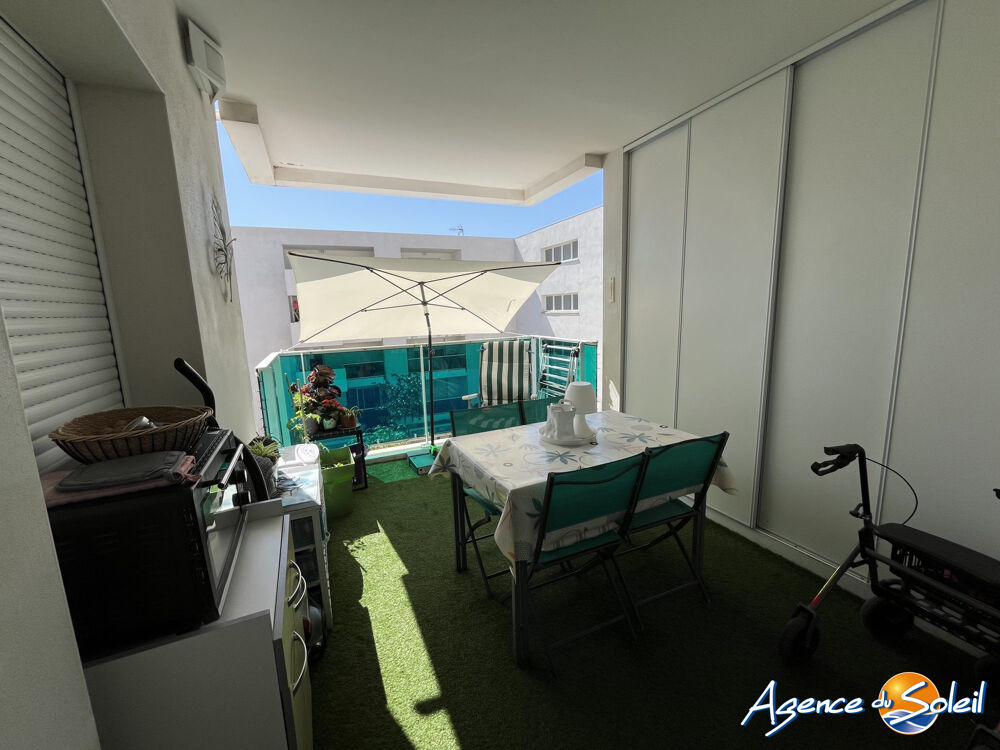 T 2 avec terrasse et parking