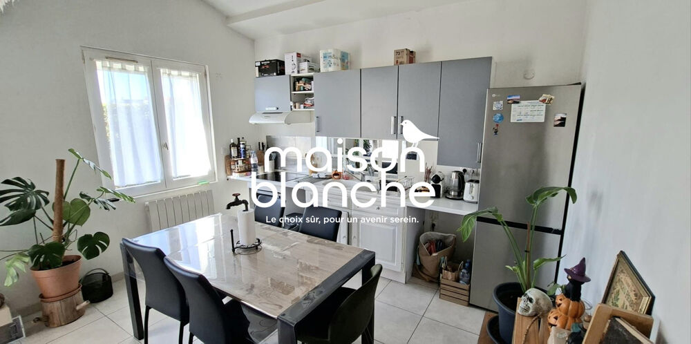 BEL APPARTEMENT AVEC JARDIN / STATIONNEMENT