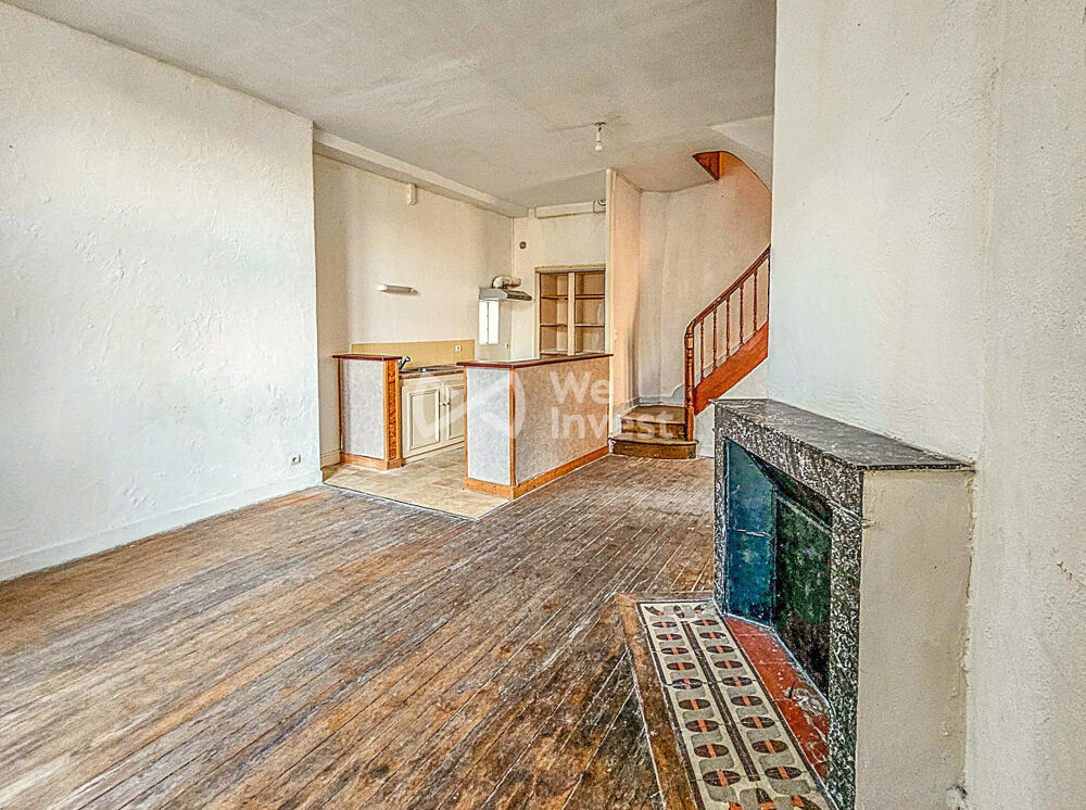 Maison de ville au fort potentiel  emplacement central et pri