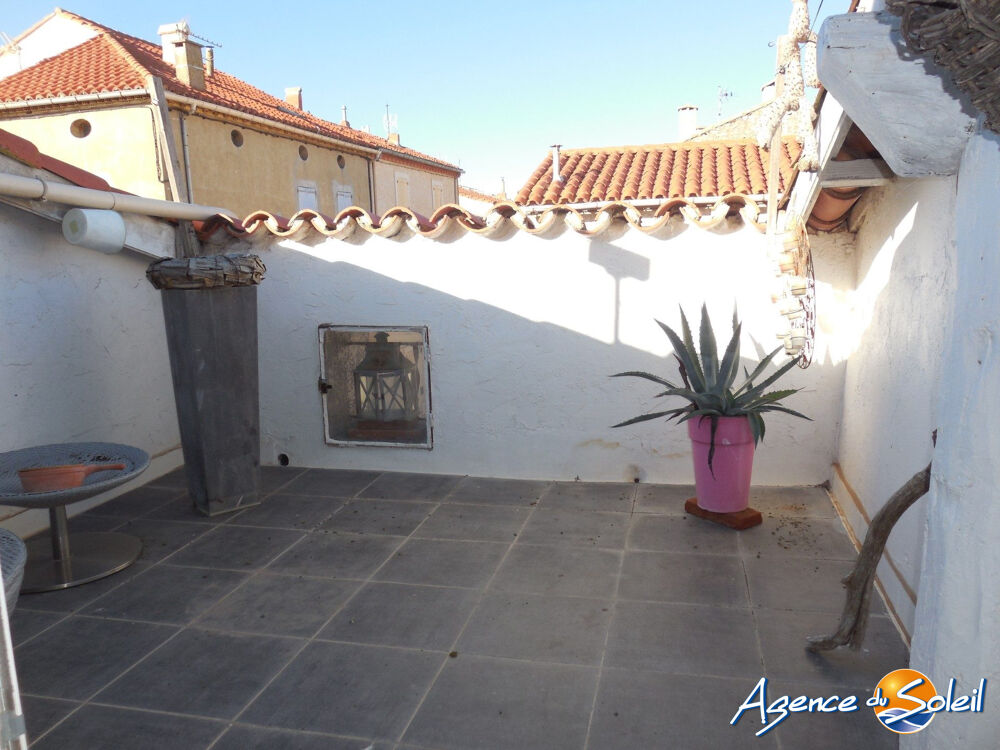 Maison de village avec terrasse de toit