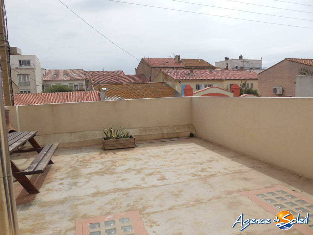 Maison de ville traversante avec garage et local commercial