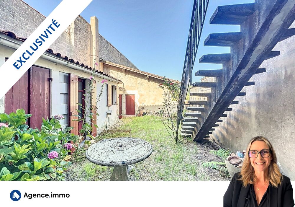 Maison duplex avec un local pro loué et garages