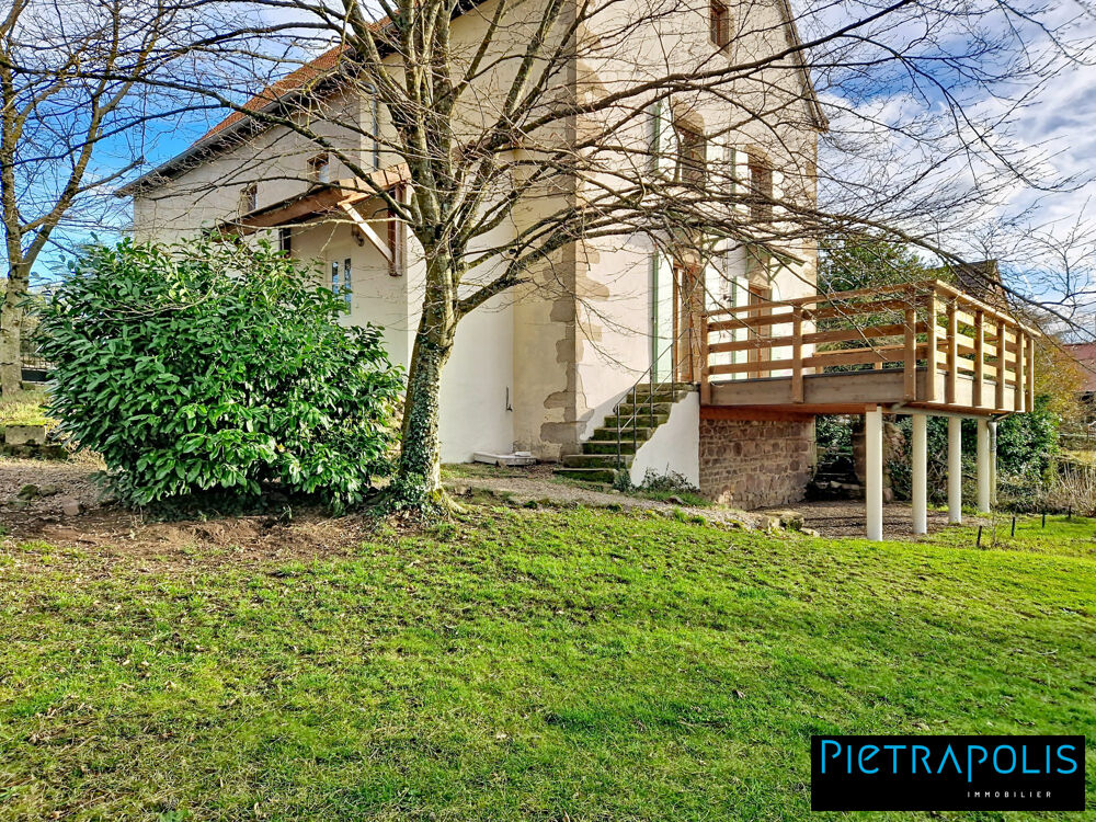 Maison avec terrasse et jardin, proche du centre