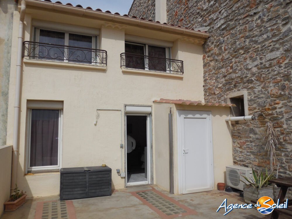 Maison de ville traversante avec garage et local commercial