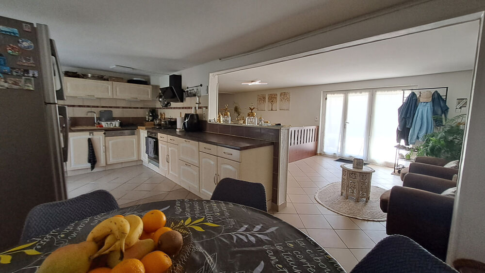 Vente Maison Maison familiale lumineuse avec grand espace de vie et terrasse couverte sur un terrain clos de 500m2. Villeneuve sur lot