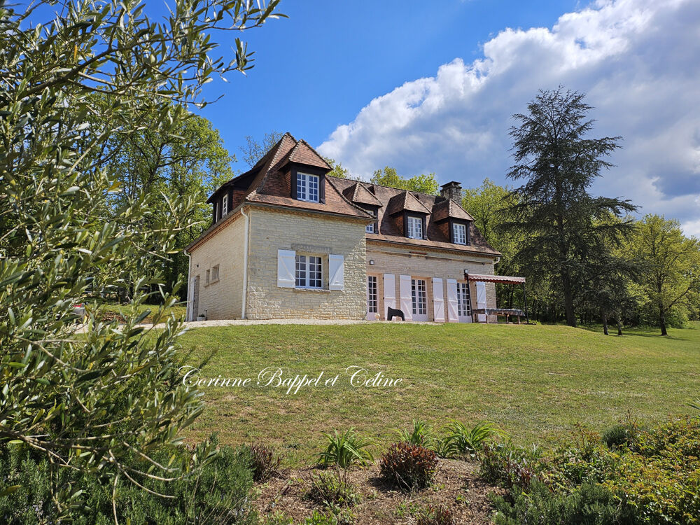 Maison en pierres entièrement relookée dans beau cadre de vie