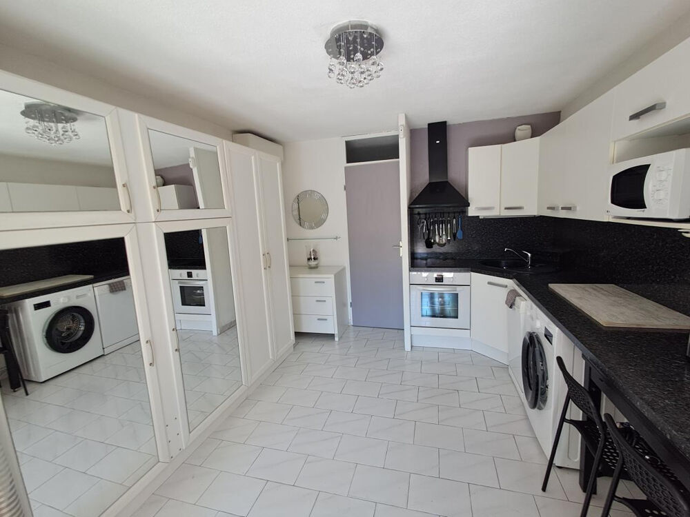 Appartement T1 cabine en rez-de-jardin avec parking.