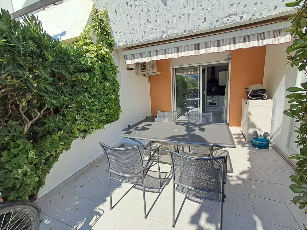 Appartement T1 cabine en rez-de-jardin avec parking.