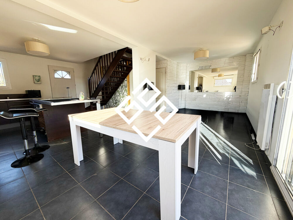 Maison avec jardin sur trois faces