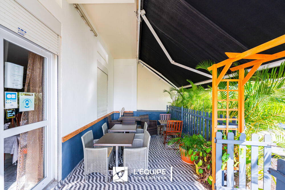 Vente Maison Bien immobilier composé d'un local commercial au RDC et d'un appartement F3 à l'étage avec balcon en vente St benoit