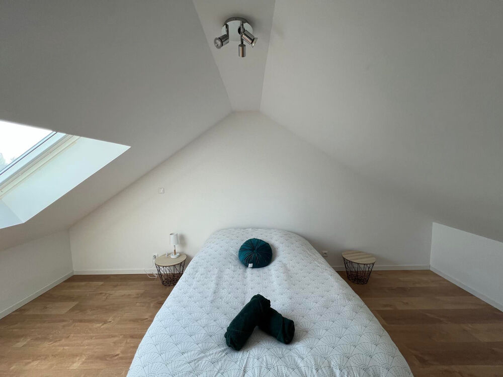Maison divisée en deux logements Centre de Parigné-lÉvêque Idéal investisseur