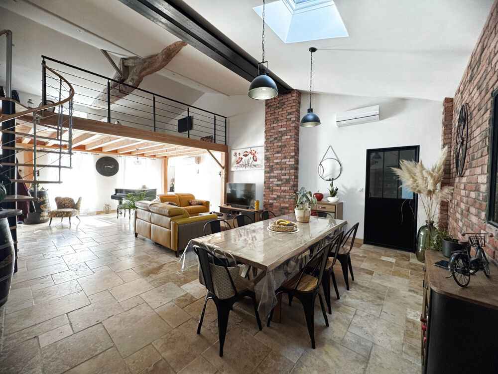 Maison de plain-pied avec jardin et garage en centre ville
