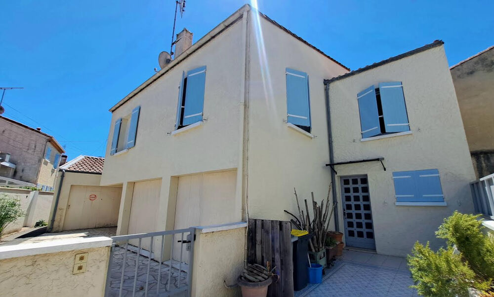 Maison centre ville 3 garages,2 terrasses 200m de la plage