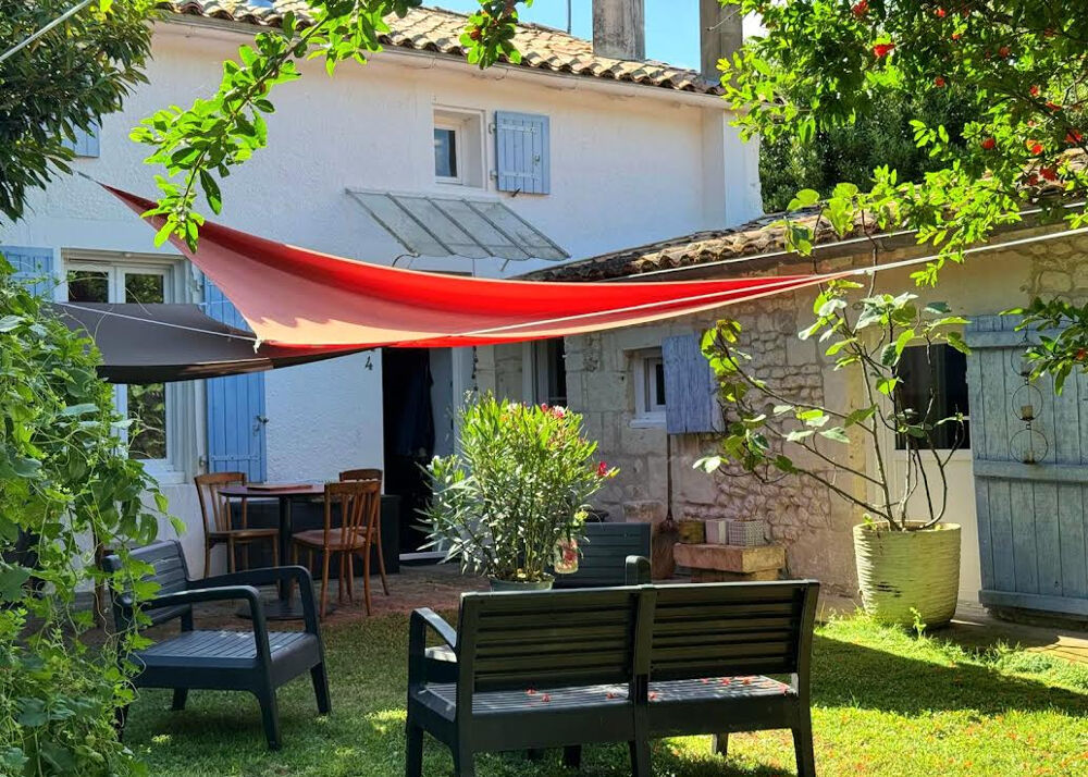 Maison atypique centre bourg avec jardin