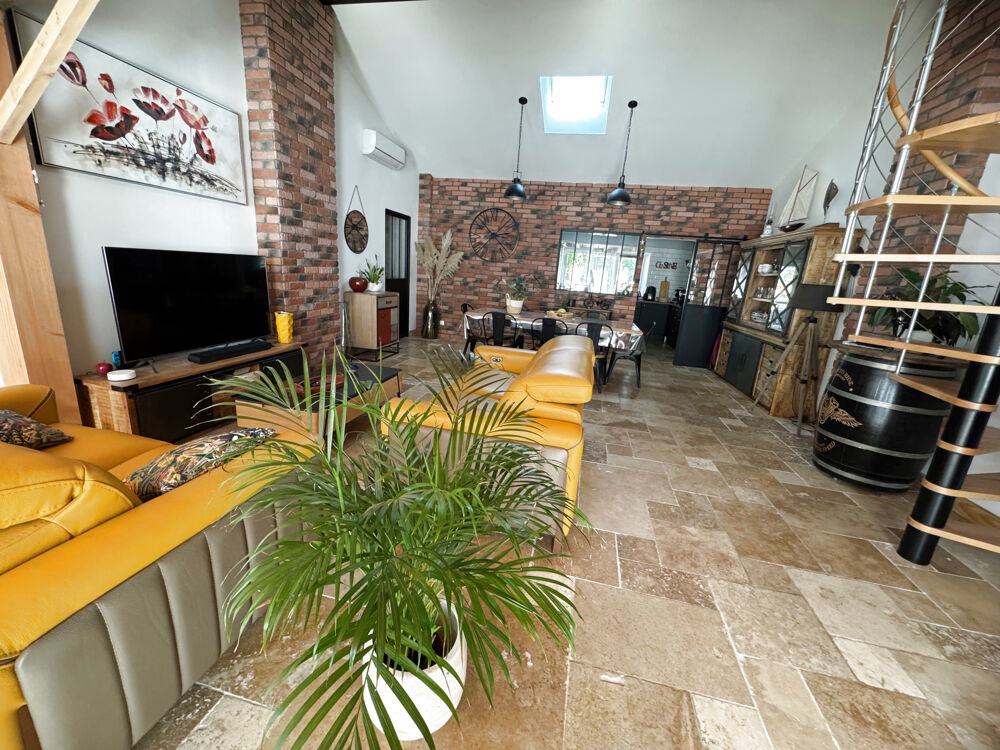 Maison de plain-pied avec jardin et garage en centre ville
