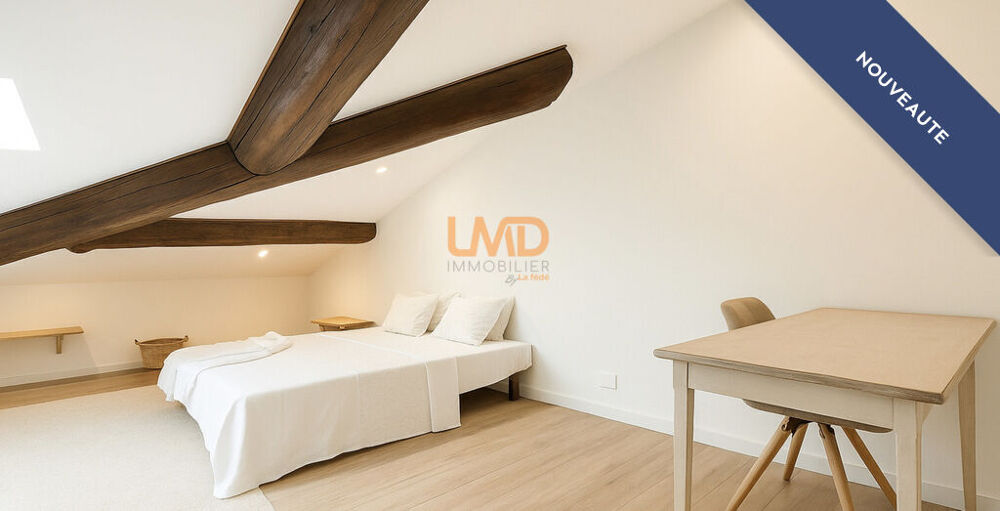 T2 atypique 50m2 au sol, centre-ville, bel immeuble