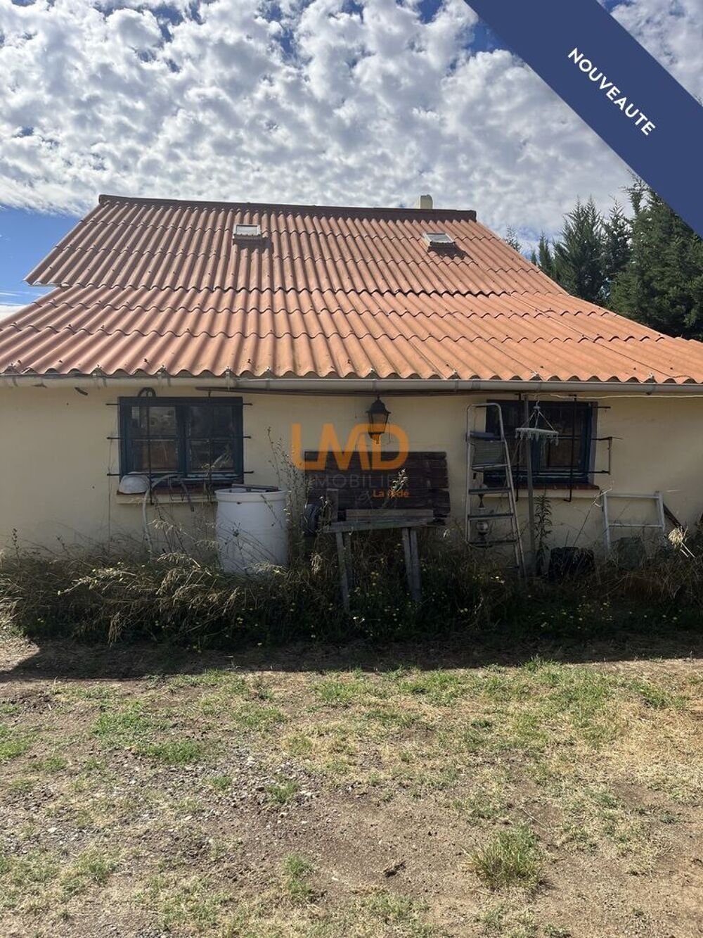Vente Maison une parcelle de terre avec construction 1975  maison 2 étages, Puisserguier