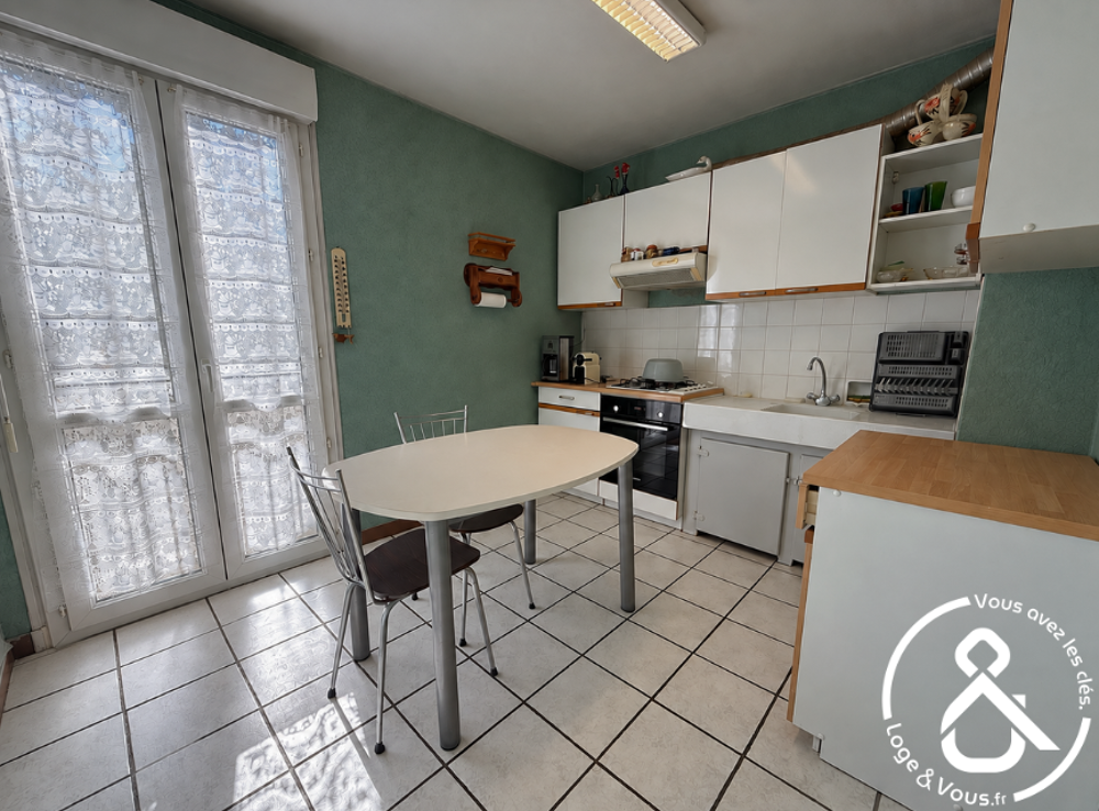 Pavillon trois chambres avec garage et jardin