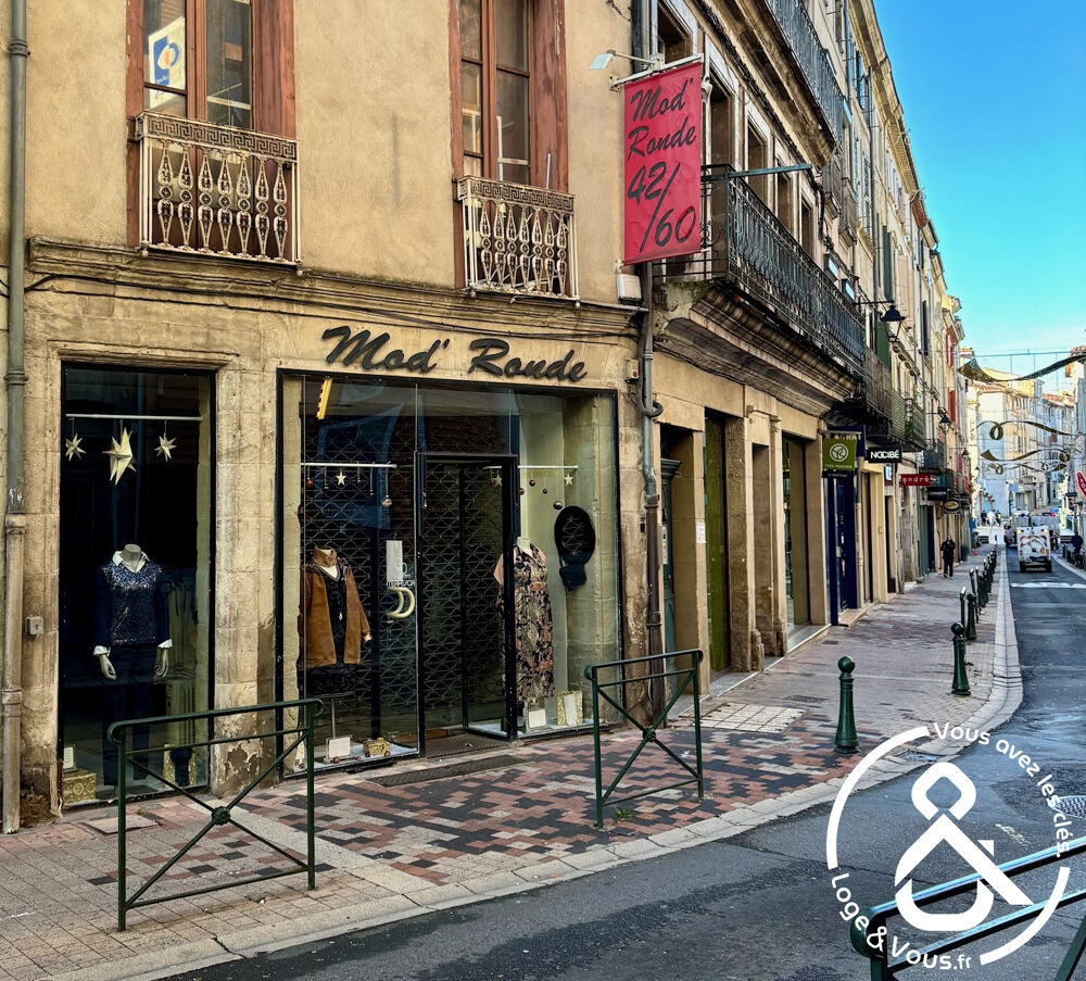   Local commercial lou�, rue commer�ante 