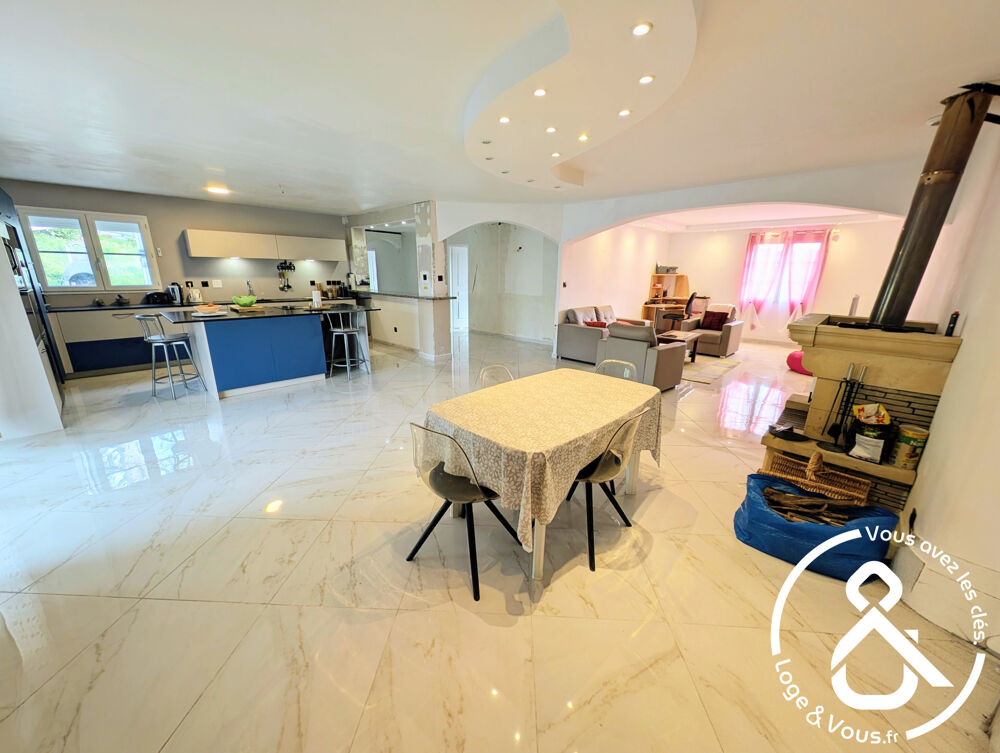 Maison sur sous sol semi-enterrée avec point de vue dominant