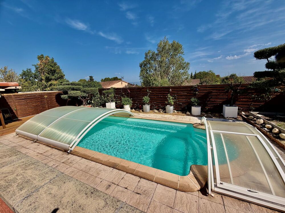 Maison plain-pied de 104 m2 sur 541 m2 de terrain avec garage double - Secteur Lavalette centre.