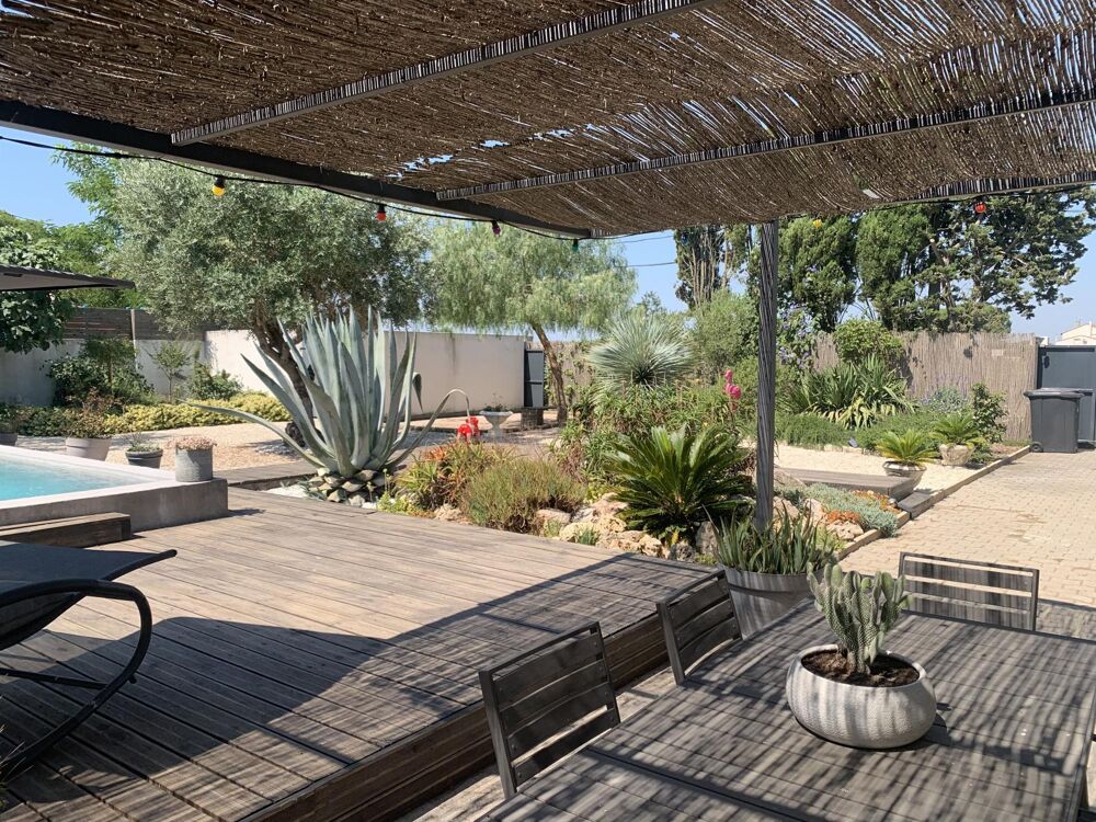 ancien mas Camarguais revisité avec soin avec piscine et jardin aménagé dans ce hameau calme proche d'Aigues Mortes