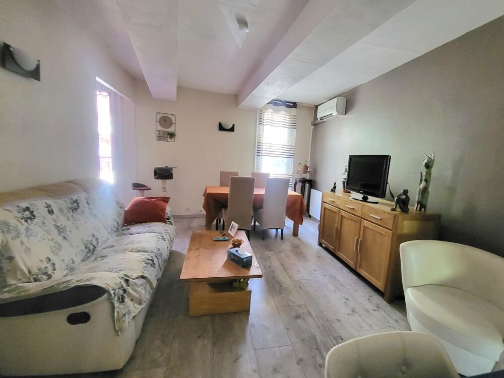 Lodeve vente appartement T2, avec bureau cours, 3 caves et jardin privé
