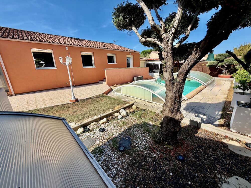 Maison plain-pied de 104 m2 sur 541 m2 de terrain avec garage double - Secteur Lavalette centre.