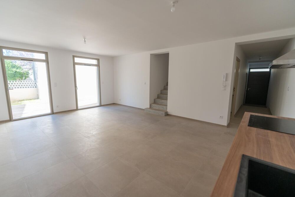 MAISON DE VILLE-GARAGE-JARDIN