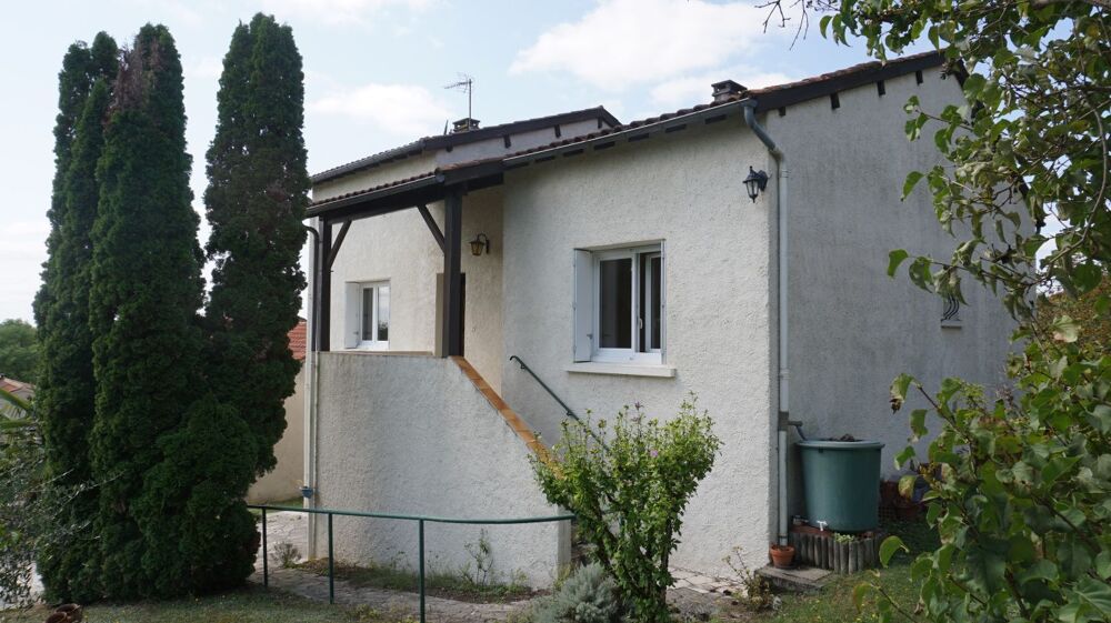 Maison traditionnelle avec jardin