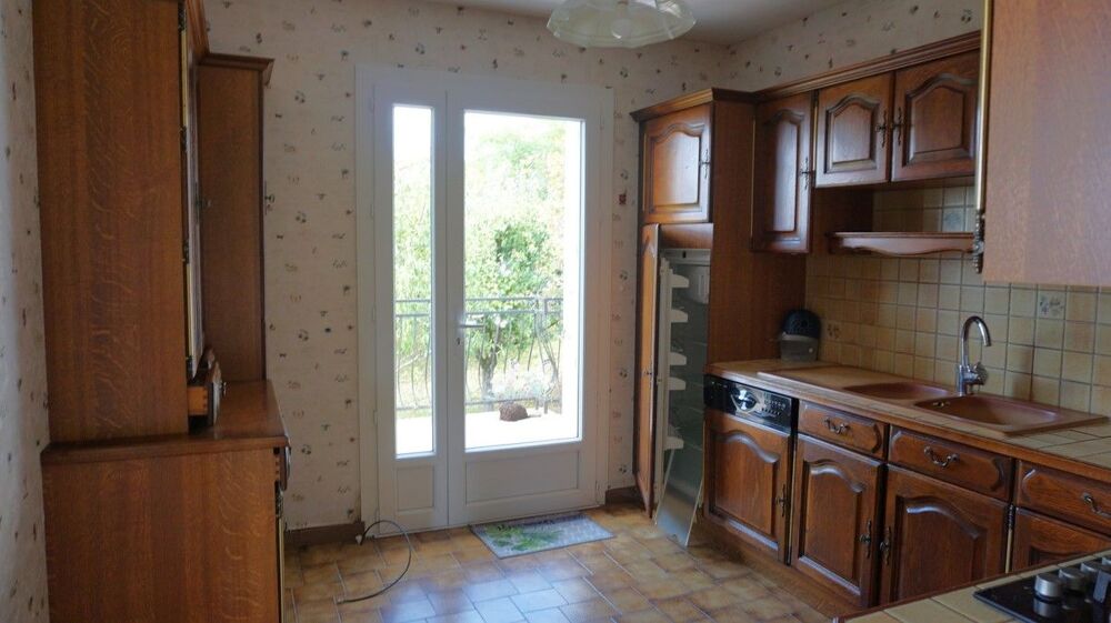 Maison traditionnelle avec jardin