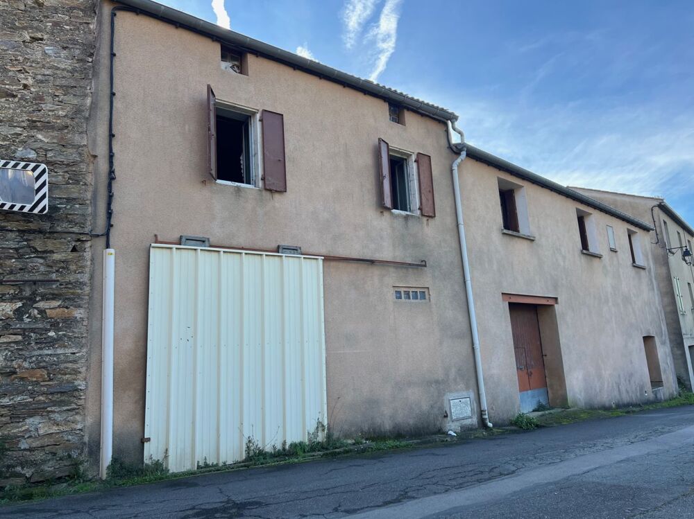 Maison de village plain-pied avec garage et belle vue