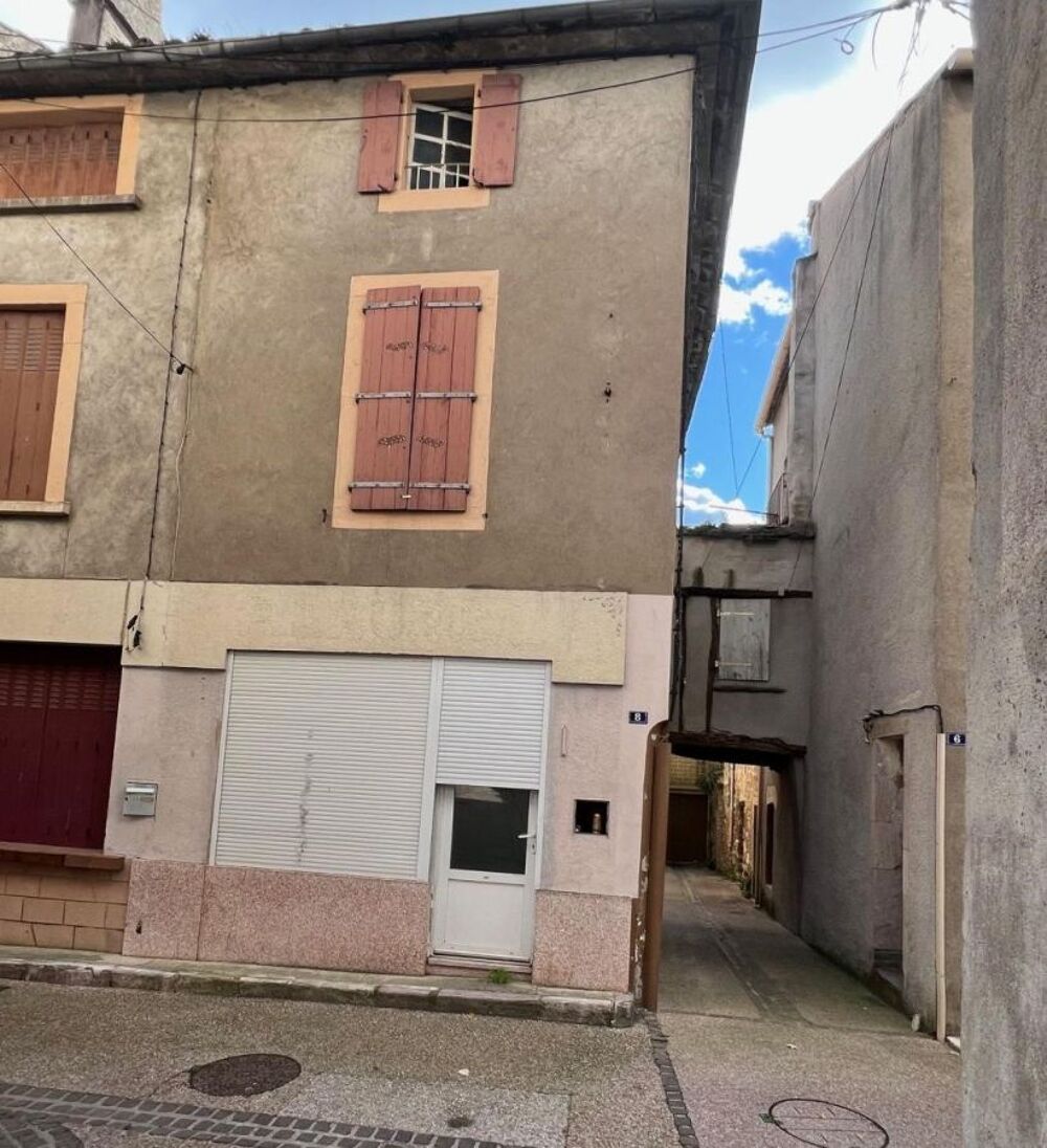 Maison de village avec terrasse toiture