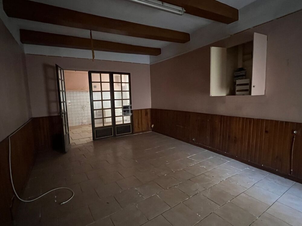 Maison de village avec terrasse toiture
