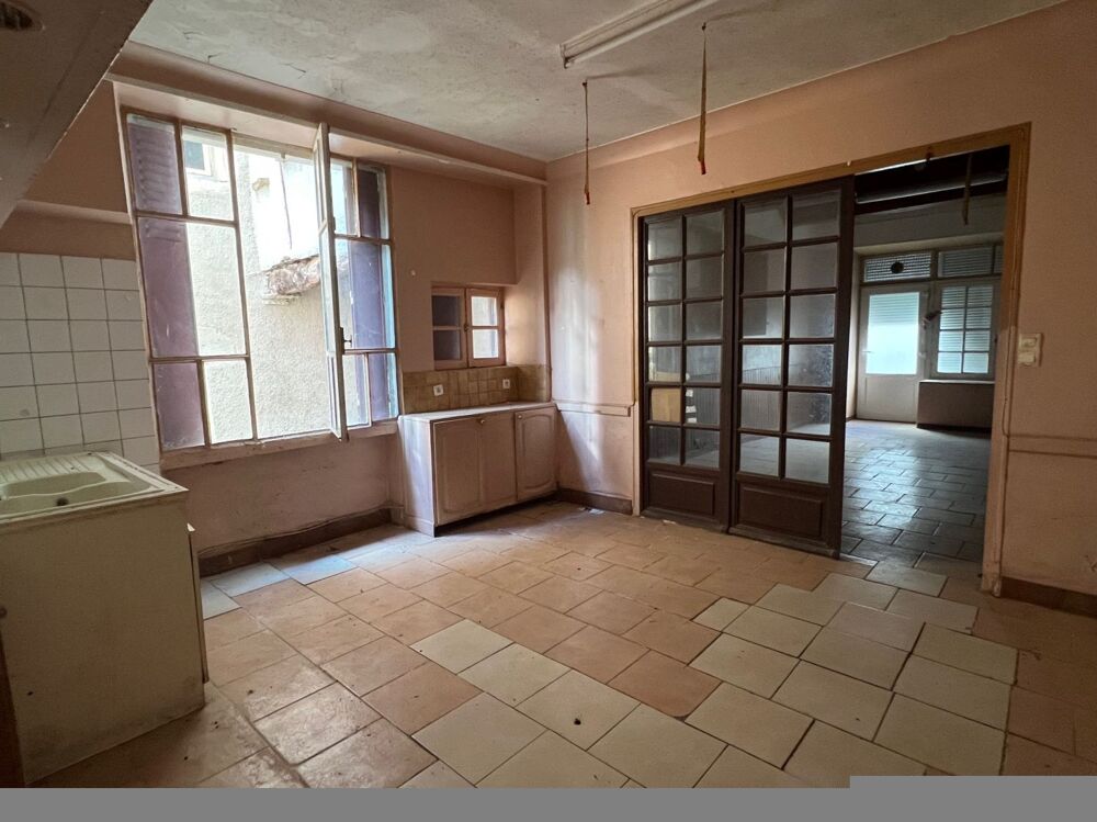 Maison de village avec terrasse toiture