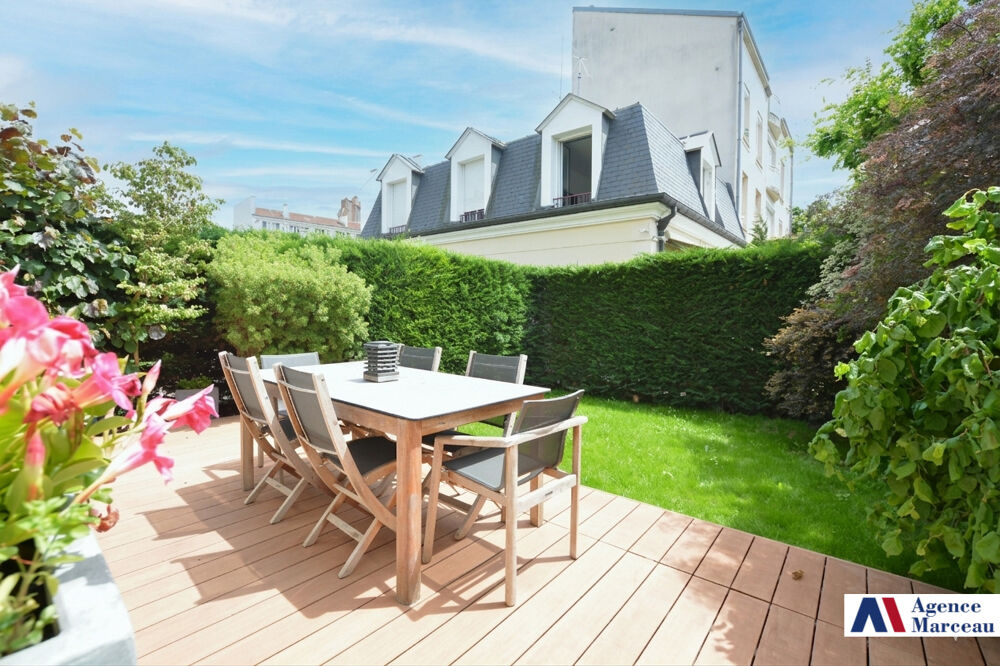 Au fond dune allée privée, maison en R+2 avec jardin, tersasses et garages