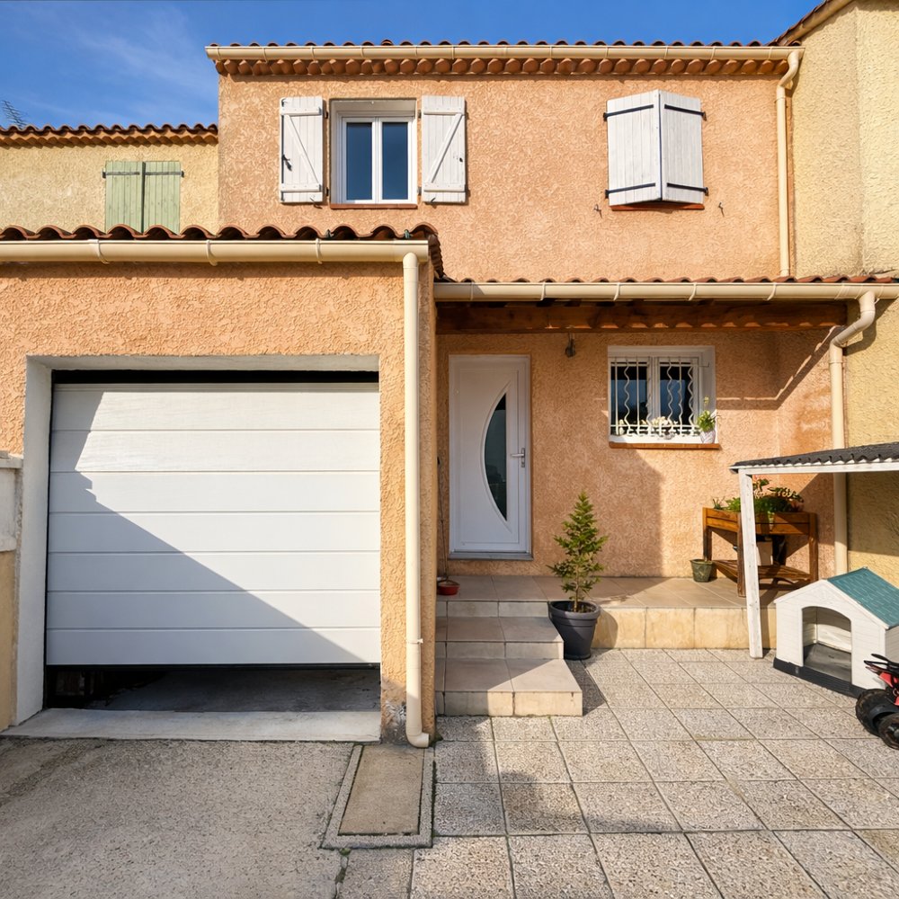 Maison de type 4 d'une superficie de 74 m2 avec garage sur une parcelle de 240 m2