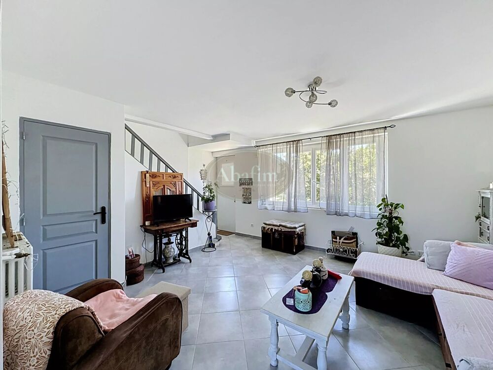 Maison jumelée avec jardin